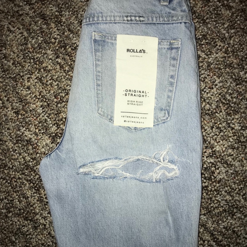 Rolla's Light Wash Straight Leg Jeans with Distressing